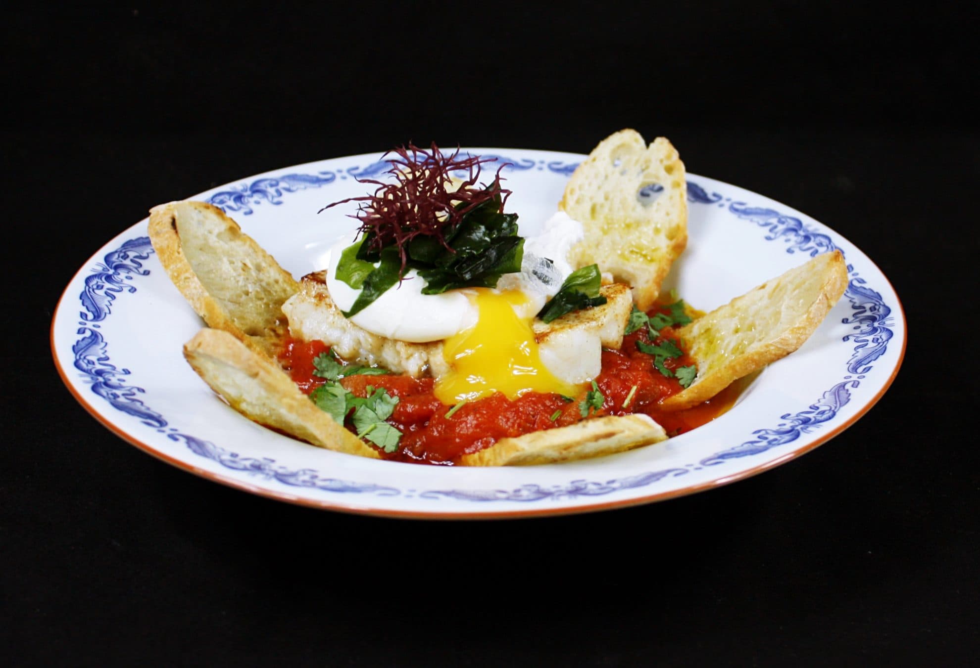 Bild på Kolja med smak av hav, tomat och pocherat ägg